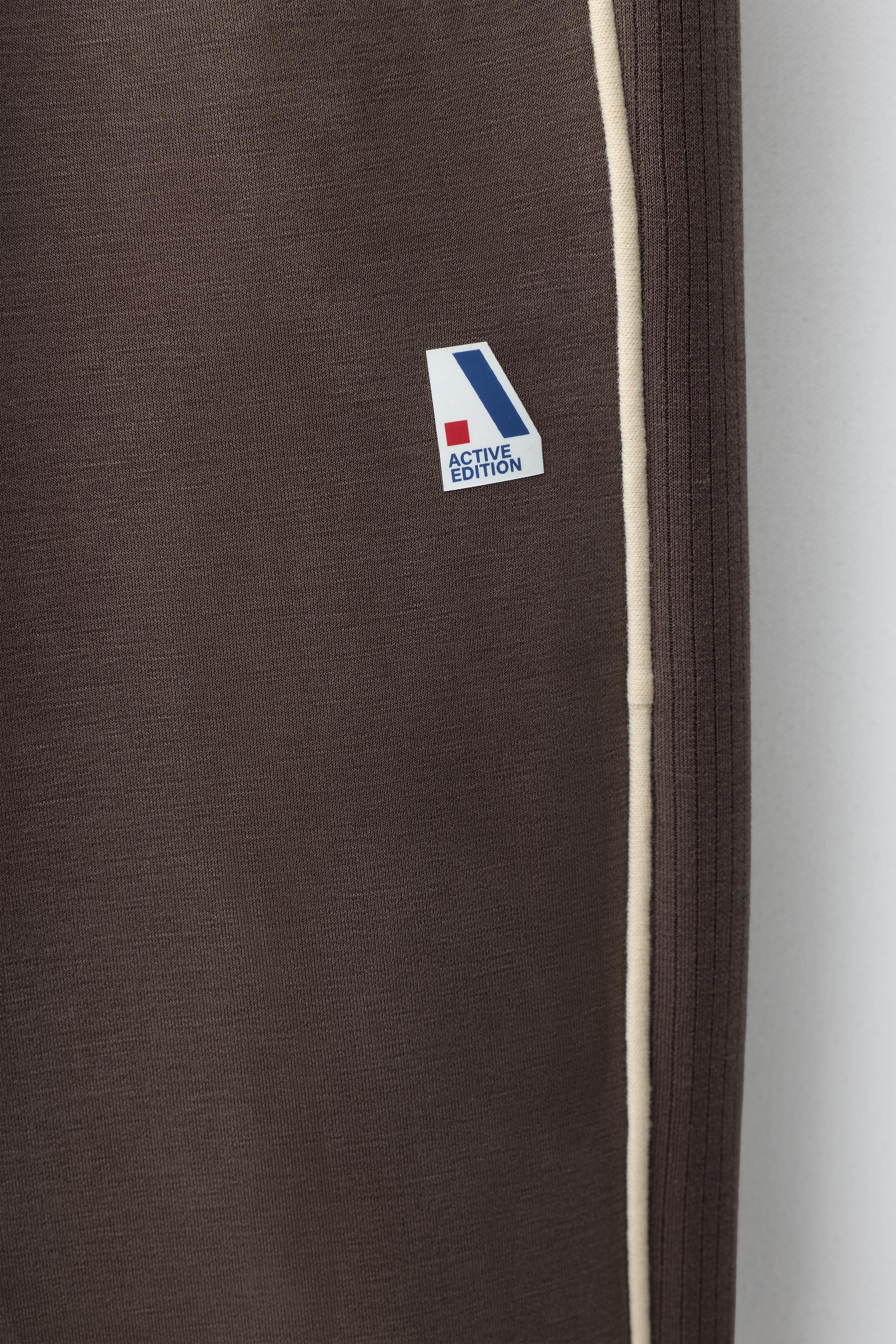 SPORTY CONTRAST PIPING TROUSERS